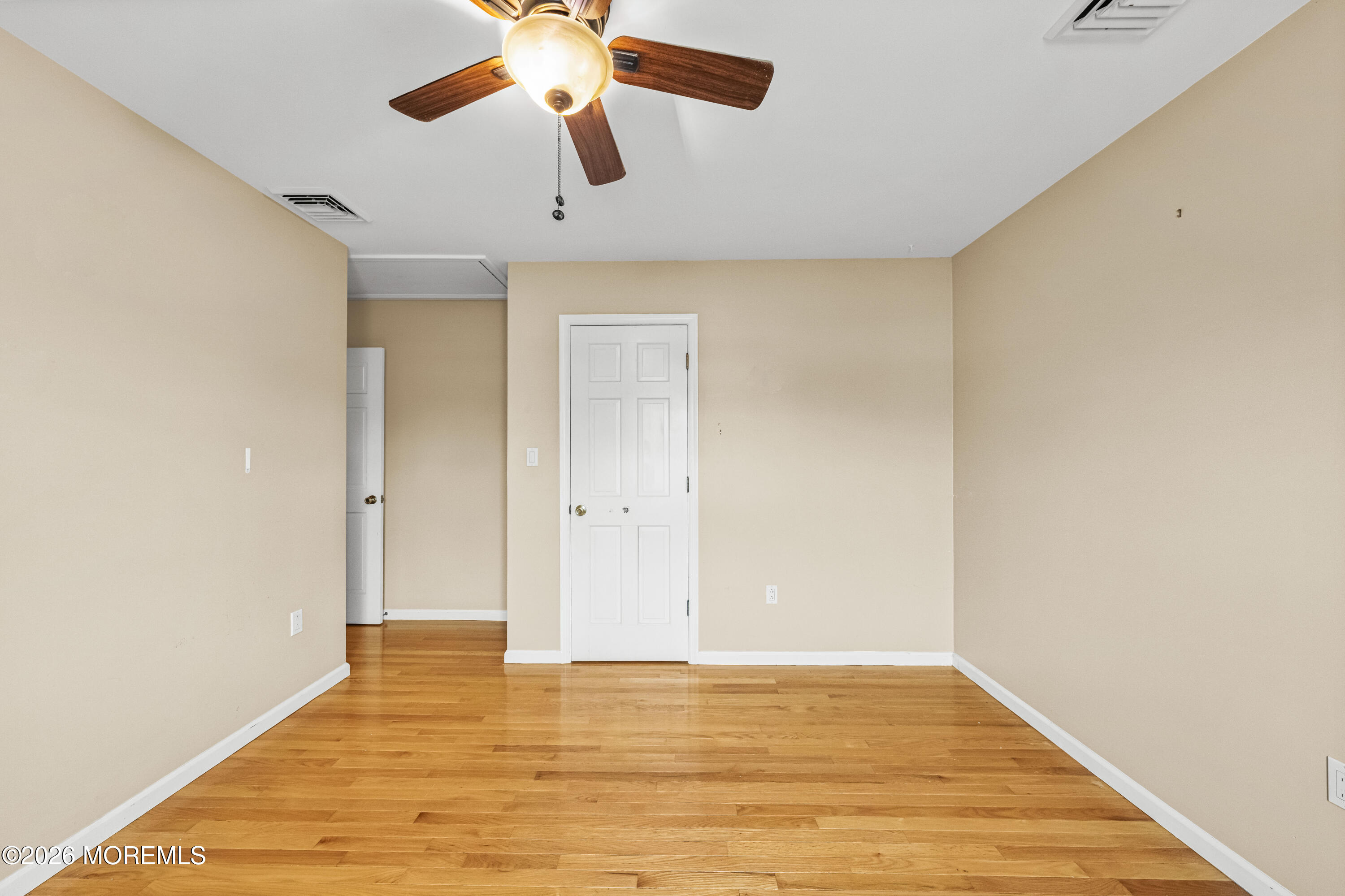 1 Kari Court Jackson, NJ 08527 - Photo 36 of 66 a view of an empty room with wooden floor