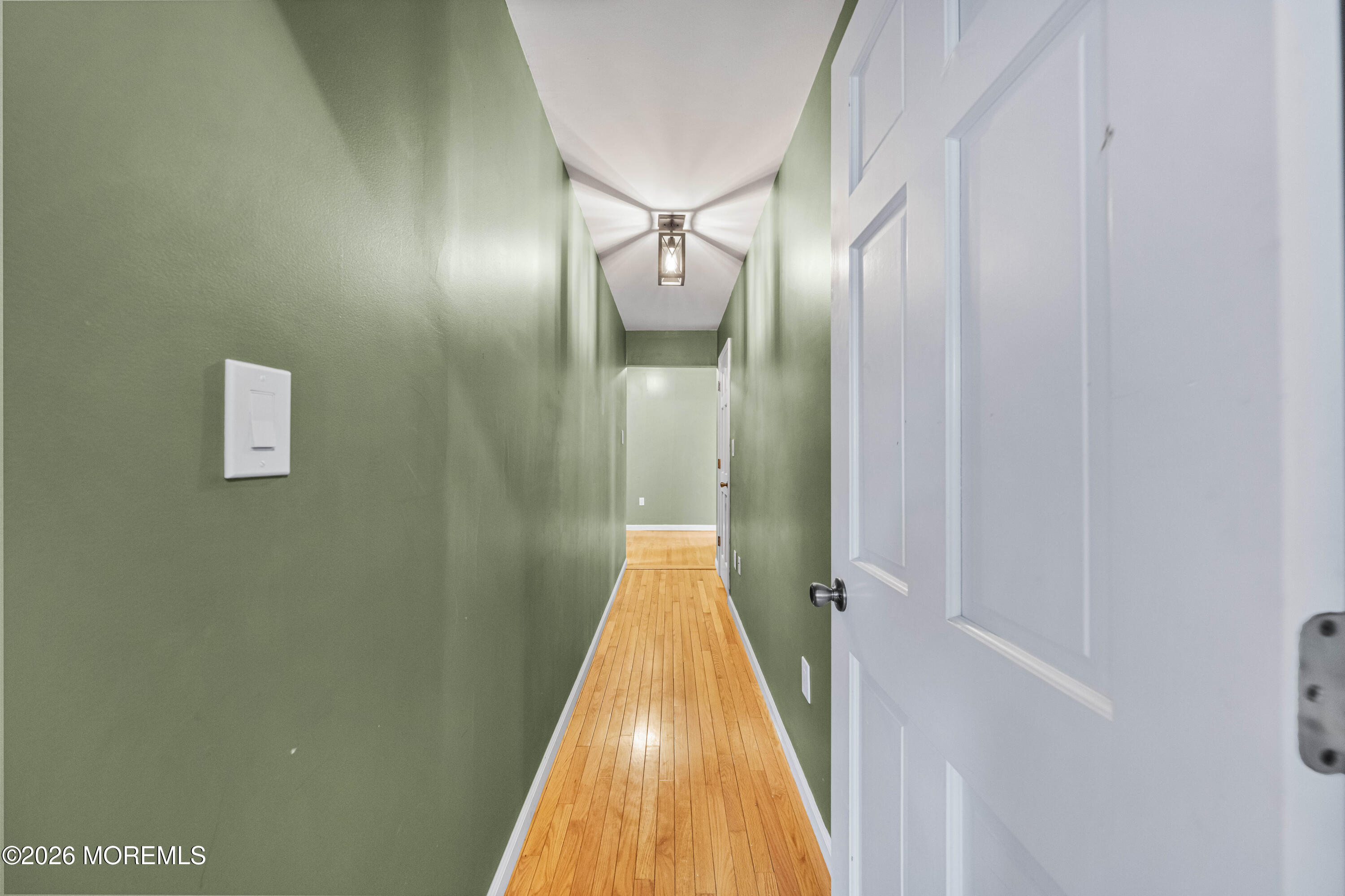 1 Kari Court Jackson, NJ 08527 - Photo 37 of 66 a view of a hallway with wooden floor