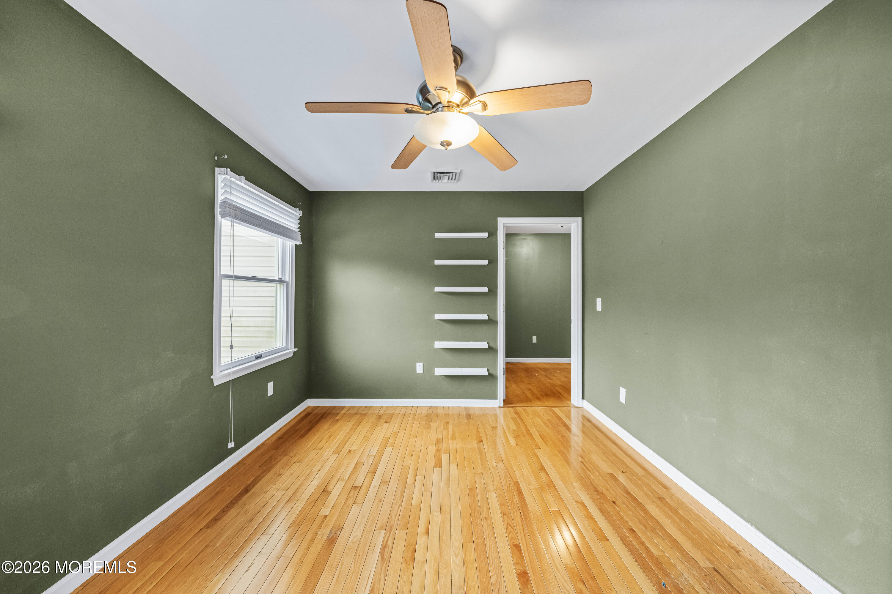 1 Kari Court Jackson, NJ 08527 - Photo 39 of 66 a view of a room with wooden floor fan and a window