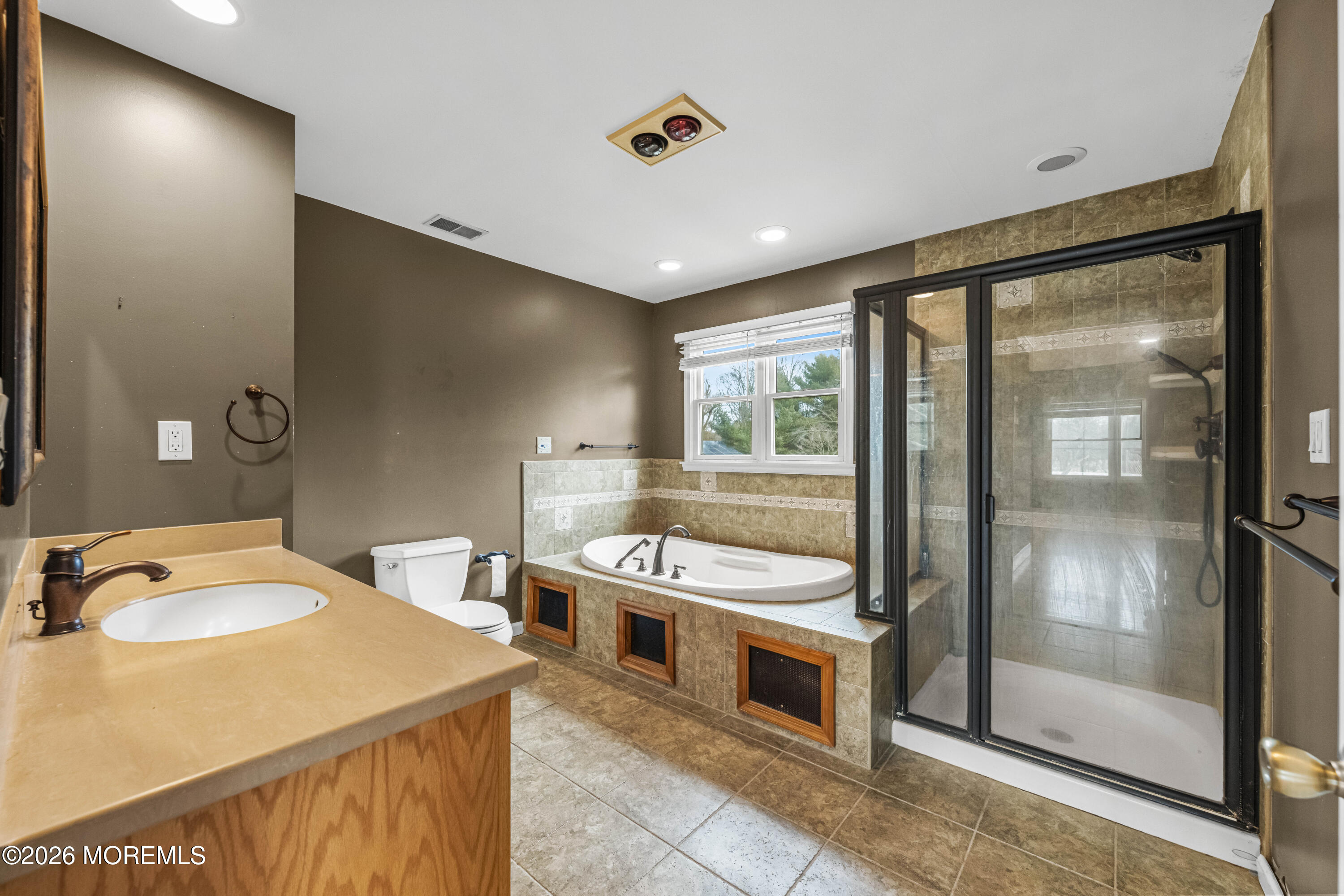 1 Kari Court Jackson, NJ 08527 - Photo 45 of 66 a bathroom with a sink a toilet and a mirror
