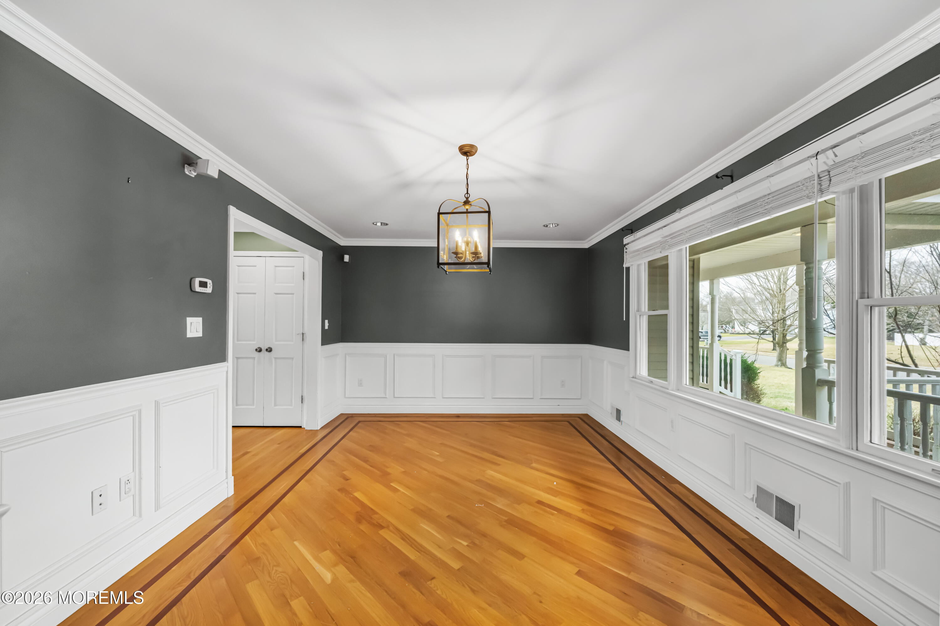 1 Kari Court Jackson, NJ 08527 - Photo 48 of 66 a view of empty room with wooden floor and fan