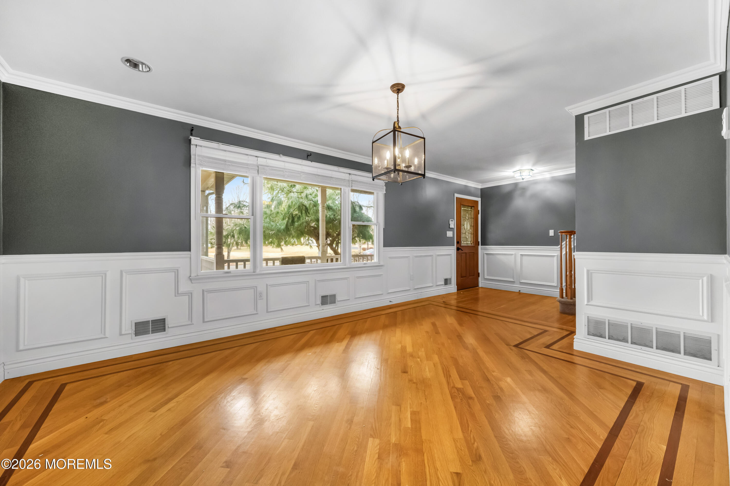1 Kari Court Jackson, NJ 08527 - Photo 49 of 66 a view of empty room with wooden floor and fan