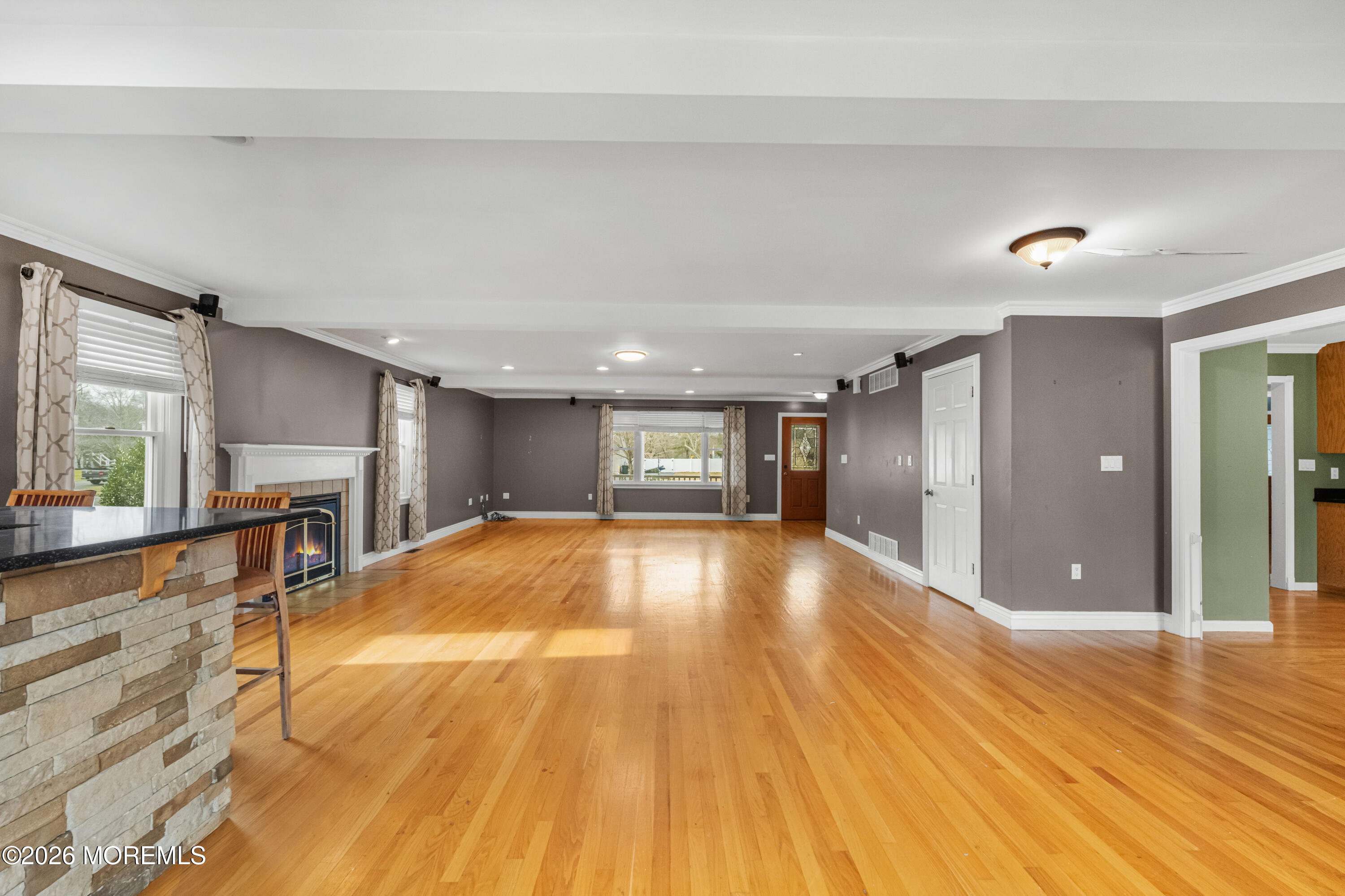 1 Kari Court Jackson, NJ 08527 - Photo 52 of 66 a view of an empty room with window and wooden floor