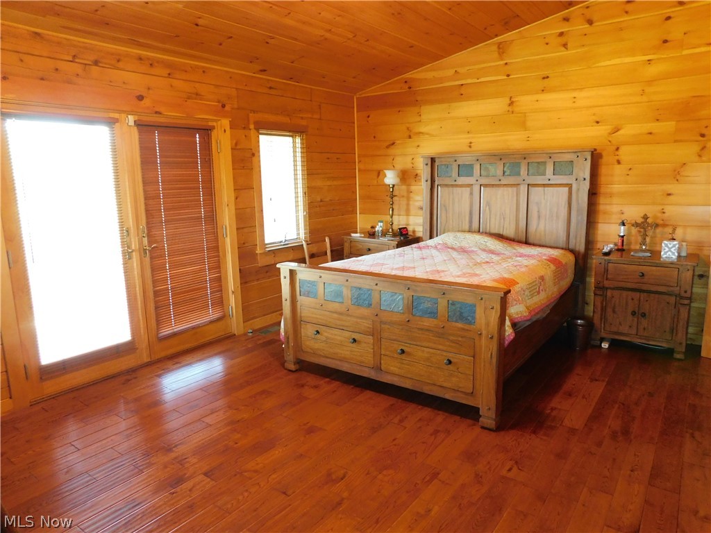3354 Rising Sun Ridge Road Walker, WV 26180 - Photo 15 of 26 Master Bedroom with french doors as well to wrap around porch area.