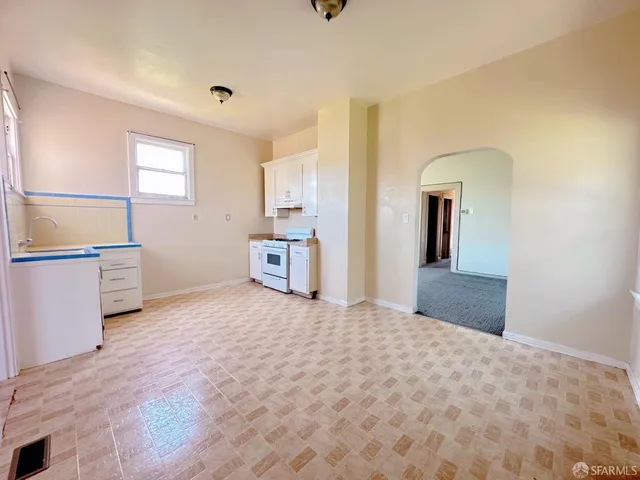 a view of livingroom with hardwood floor and hallway