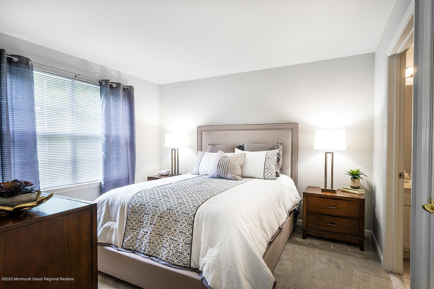 125 Timber Ridge Court Neptune, NJ 07753 - Photo 14 of 21 a bedroom with a bed and a window