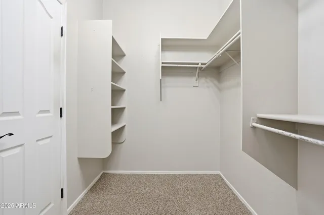 a view of an empty walk in closet
