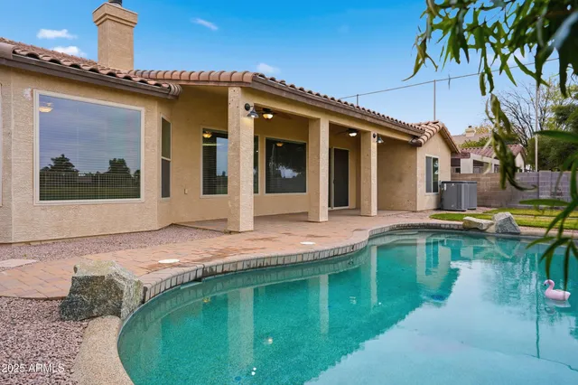 a view of a house with a swimming pool
