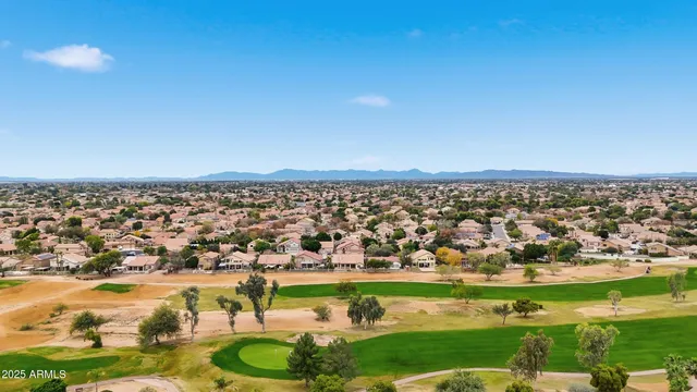 an aerial view of a city with lots of residential buildings