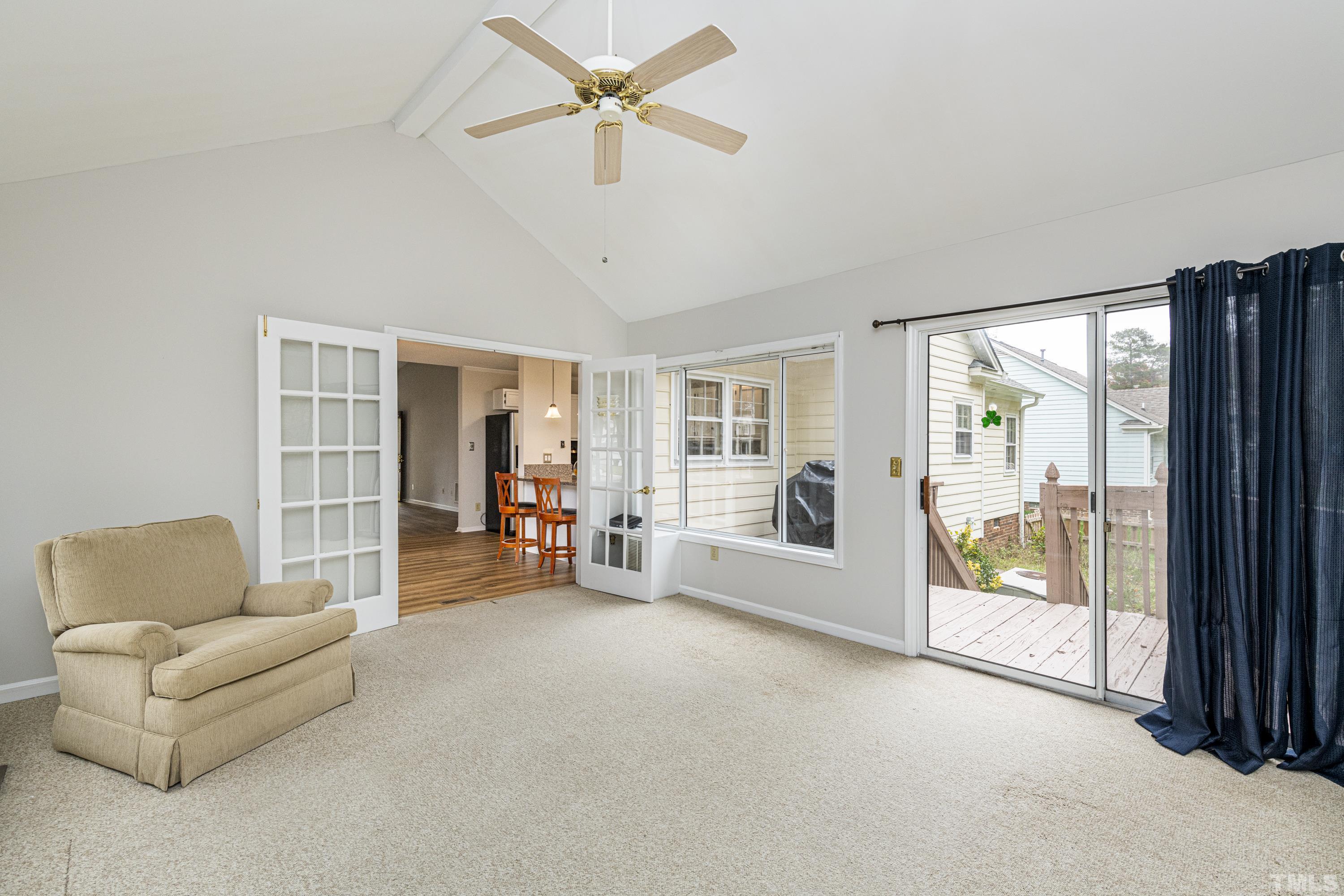 11913 North Exeter Way Raleigh, NC 27613 - Photo 17 of 29 a living room with furniture and a window