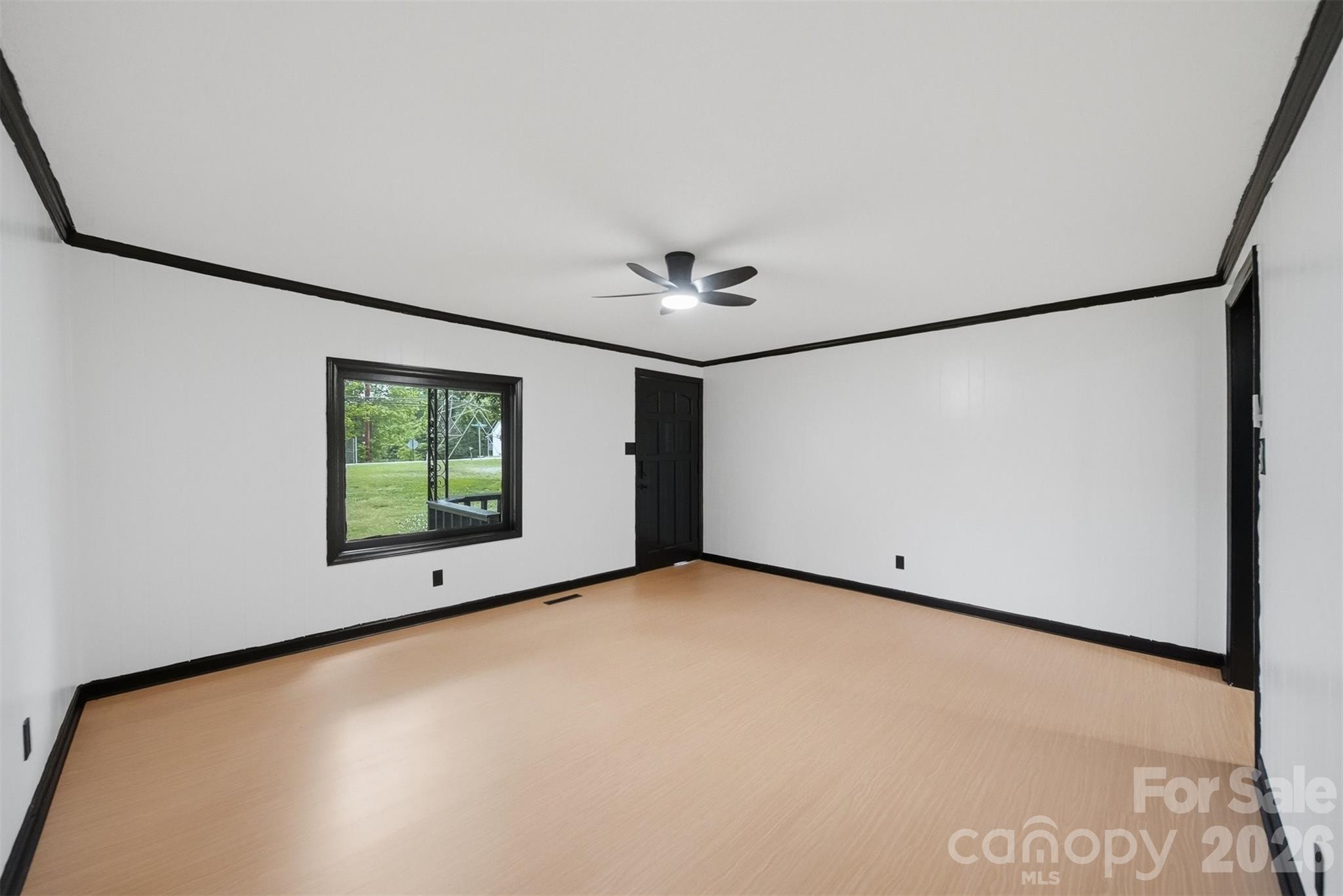 201 Cape Hickory Road Hickory, NC 28601 - Photo 4 of 16 a view of an empty room with a window