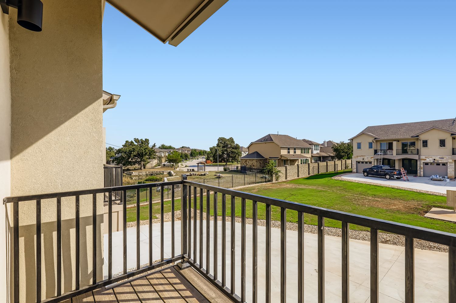 202 Tesla Circle Austin, TX 78681 - Photo 2 of 35 a balcony view with two chairs