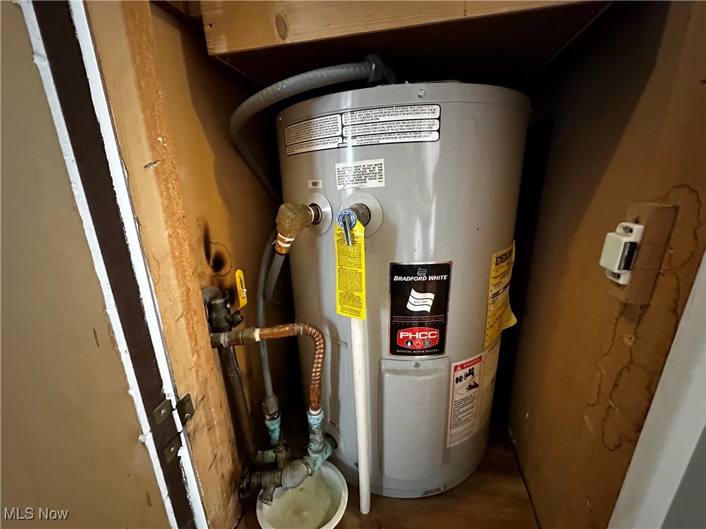 12921 Springfield Road, Unit 12S New Springfield, OH 44443 - Photo 7 of 25 Utilities featuring electric water heater