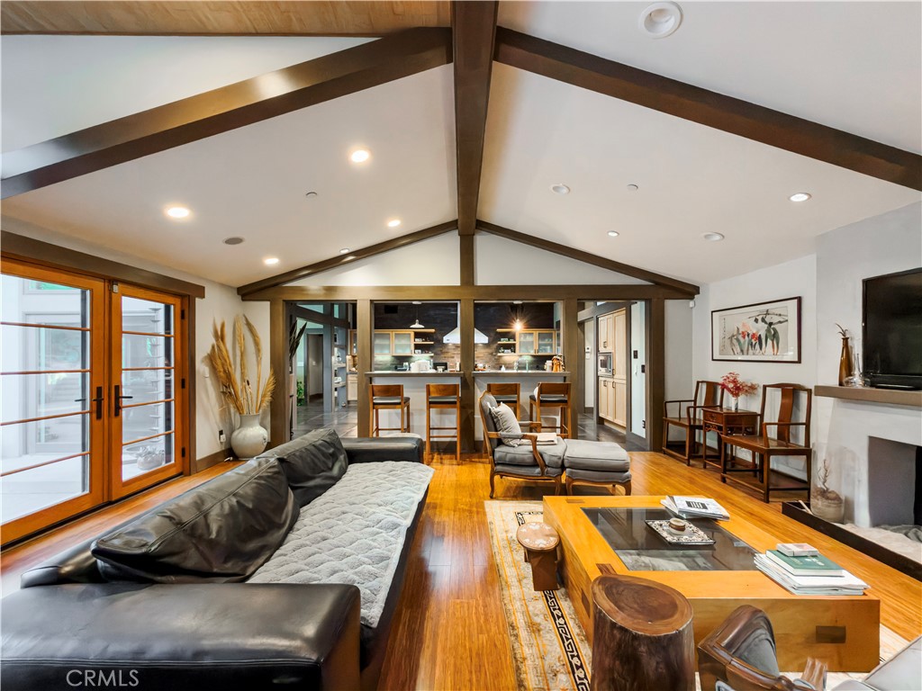 865 West Foothill Boulevard Arcadia, CA 91006 - Photo 12 of 44 a living room with furniture and a flat screen tv