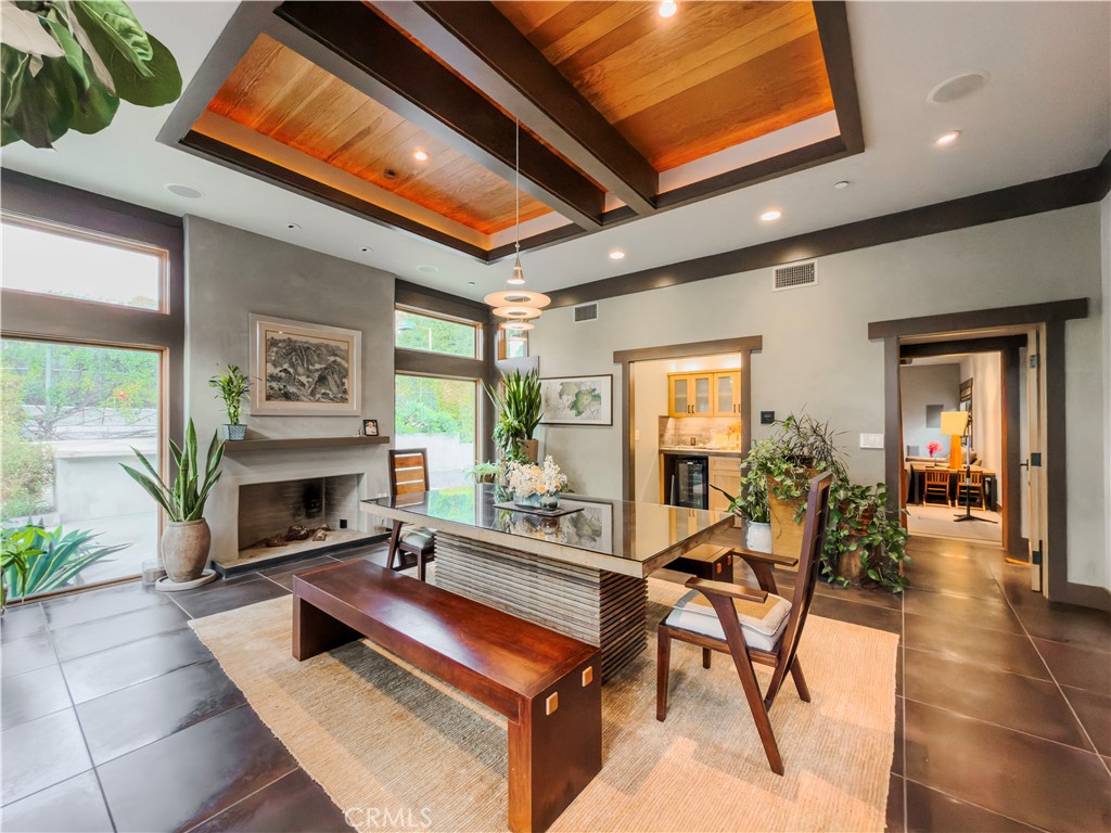 865 West Foothill Boulevard Arcadia, CA 91006 - Photo 20 of 44 a living room with furniture a fireplace and a potted plant