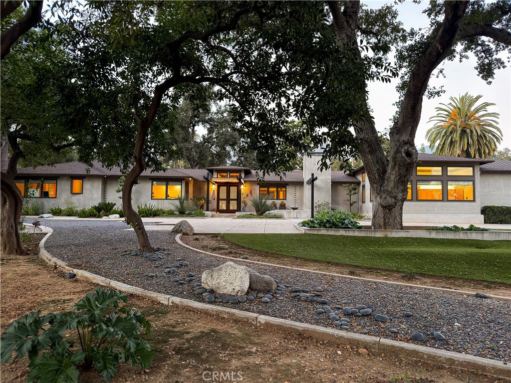 865 West Foothill Boulevard Arcadia, CA 91006 - Photo 2 of 44 a front view of a house with a yard
