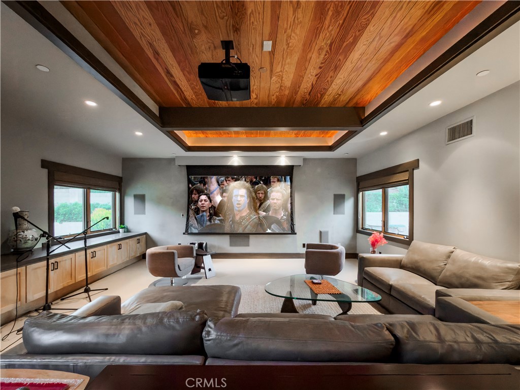 865 West Foothill Boulevard Arcadia, CA 91006 - Photo 22 of 44 a living room with furniture and a flat screen tv