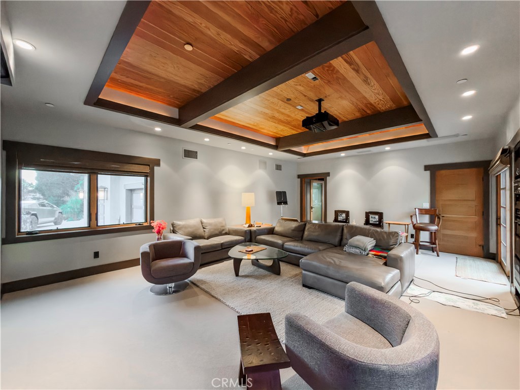 865 West Foothill Boulevard Arcadia, CA 91006 - Photo 23 of 44 a living room with furniture a large window