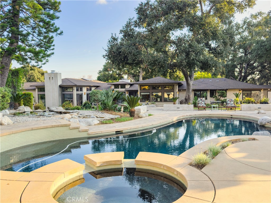 865 West Foothill Boulevard Arcadia, CA 91006 - Photo 38 of 44 a view of a swimming pool with a patio