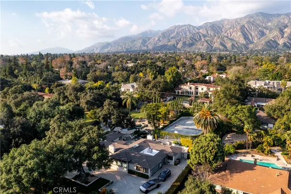 an aerial view of residential house and outdoor space