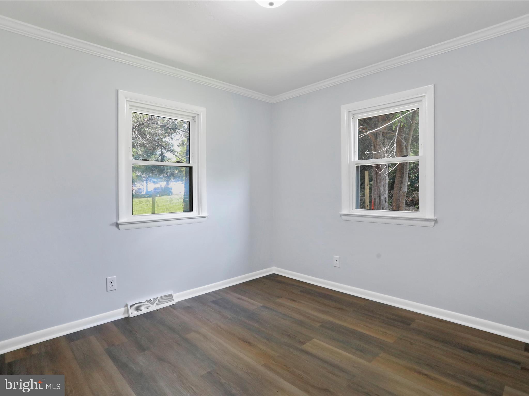 115 Blue Ridge Lane White Post, VA 22663 - Photo 13 of 35 a view of an empty room with window and wooden floor