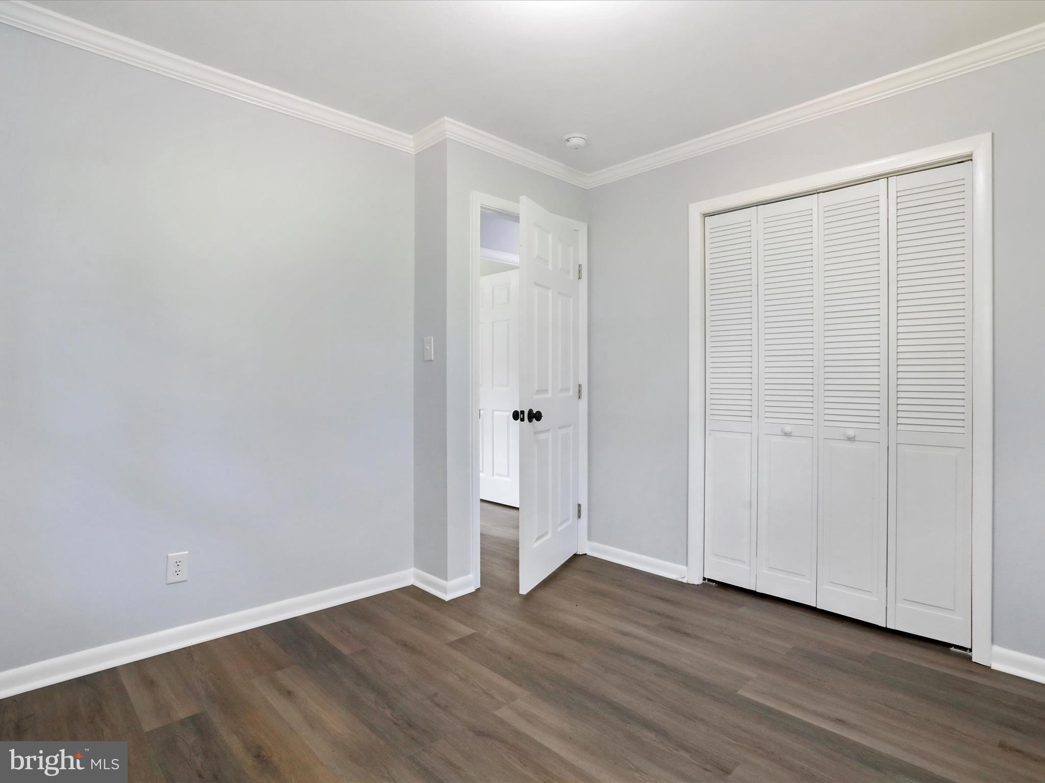 115 Blue Ridge Lane White Post, VA 22663 - Photo 14 of 35 a view of an empty room with wooden floor