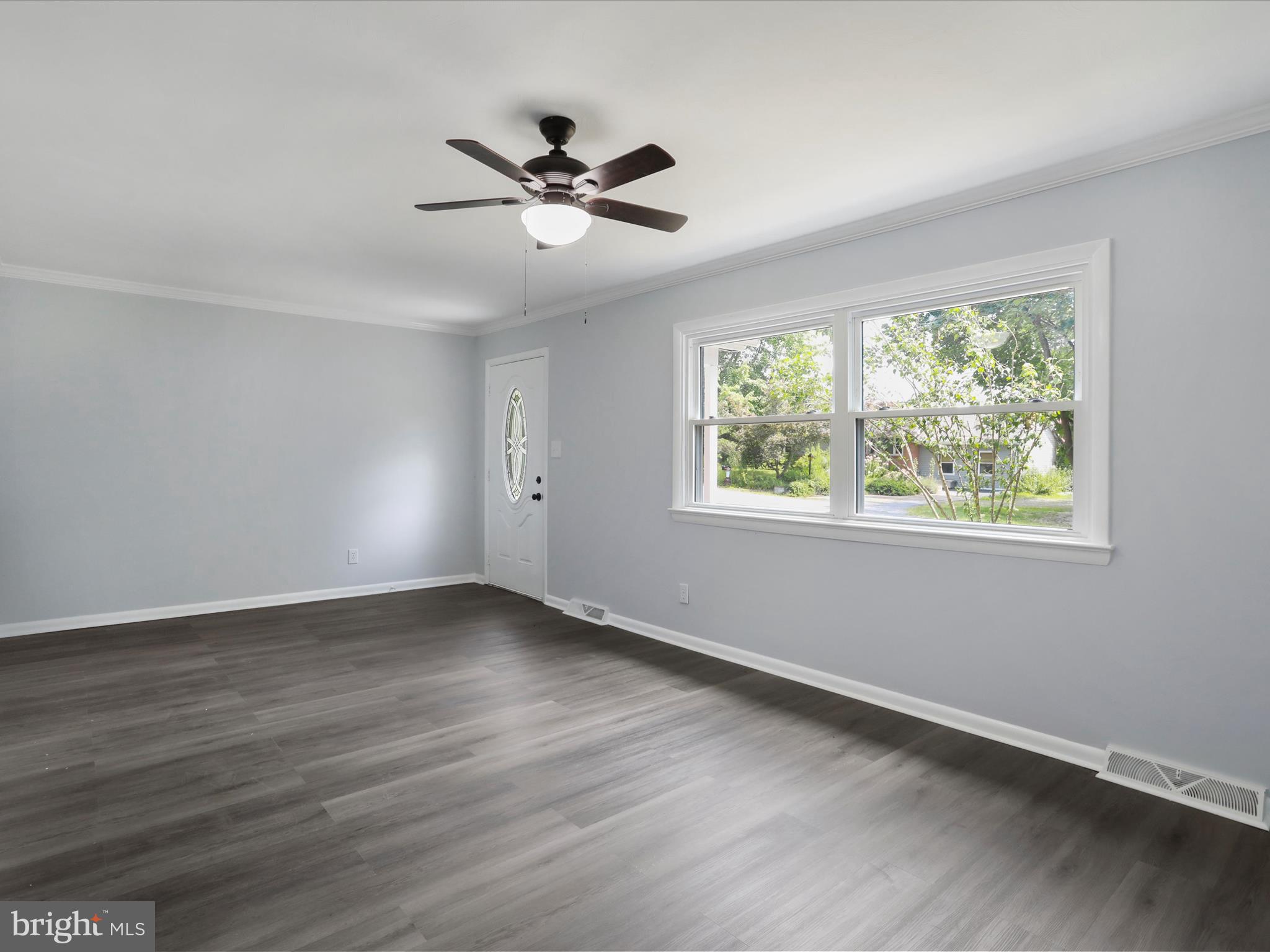 115 Blue Ridge Lane White Post, VA 22663 - Photo 8 of 35 a view of an empty room with wooden floor and a window