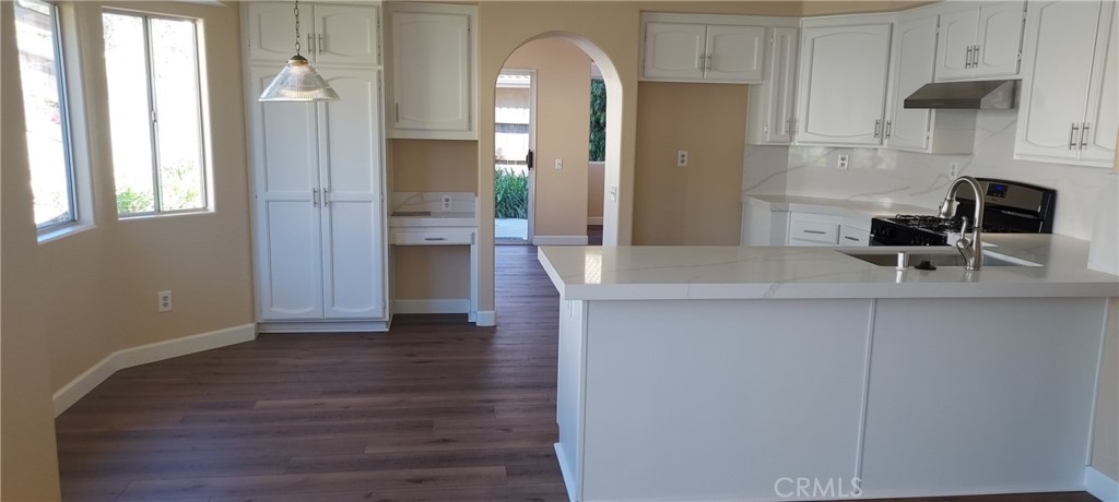 2186 Luz Way Oceanside, CA 92056 - Photo 15 of 24 a bathroom with a sink and a mirror