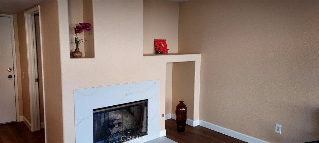 2186 Luz Way Oceanside, CA 92056 - Photo 16 of 24 a living room with furniture and a fireplace