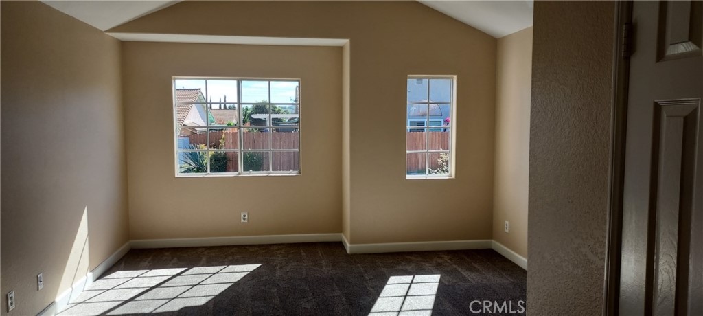 2186 Luz Way Oceanside, CA 92056 - Photo 18 of 24 a view of an empty room with a window