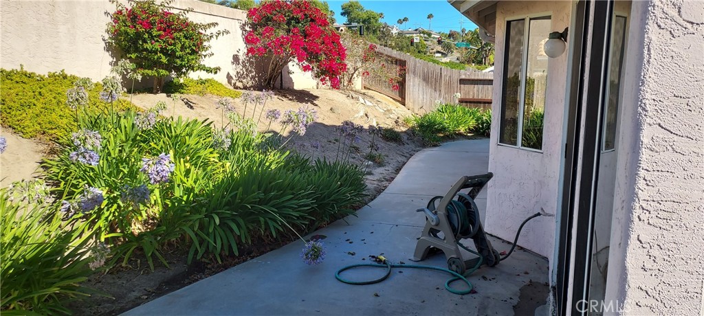 2186 Luz Way Oceanside, CA 92056 - Photo 21 of 24 a view of a house with a yard
