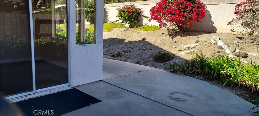 2186 Luz Way Oceanside, CA 92056 - Photo 22 of 24 a view of a backyard of a house