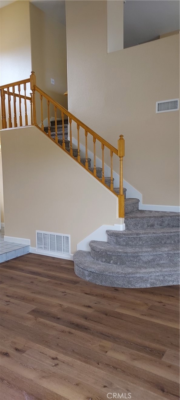 2186 Luz Way Oceanside, CA 92056 - Photo 8 of 24 a view of entryway and hall with wooden floor