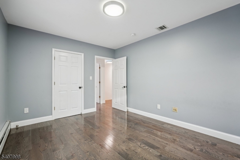 20 Fairmount Road New Providence, NJ 07974 - Photo 15 of 23 wooden floor in an empty room
