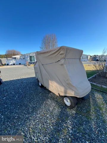 a view of swimming pool with a table and chairs