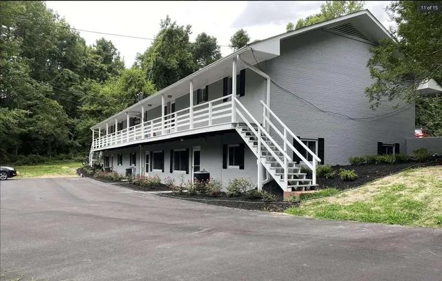 a house with trees in the background