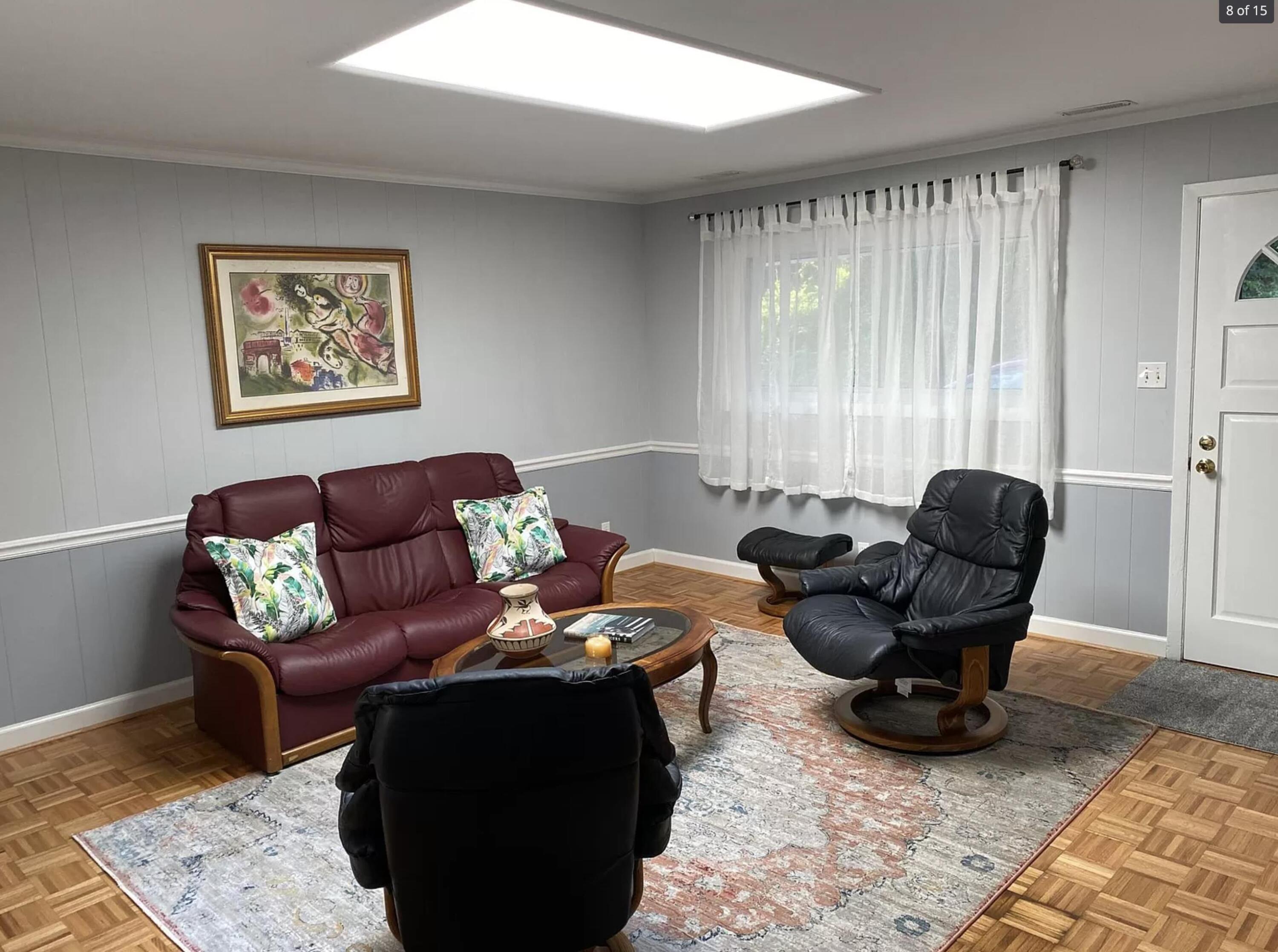 1416 Old Lystra Road, Unit 3 Chapel Hill, NC 27517 - Photo 4 of 11 a living room with furniture rug and a window