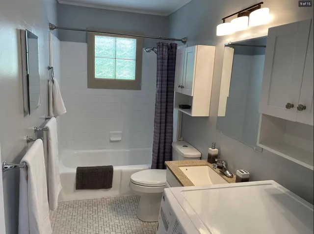 a workspace with furniture and wooden floor