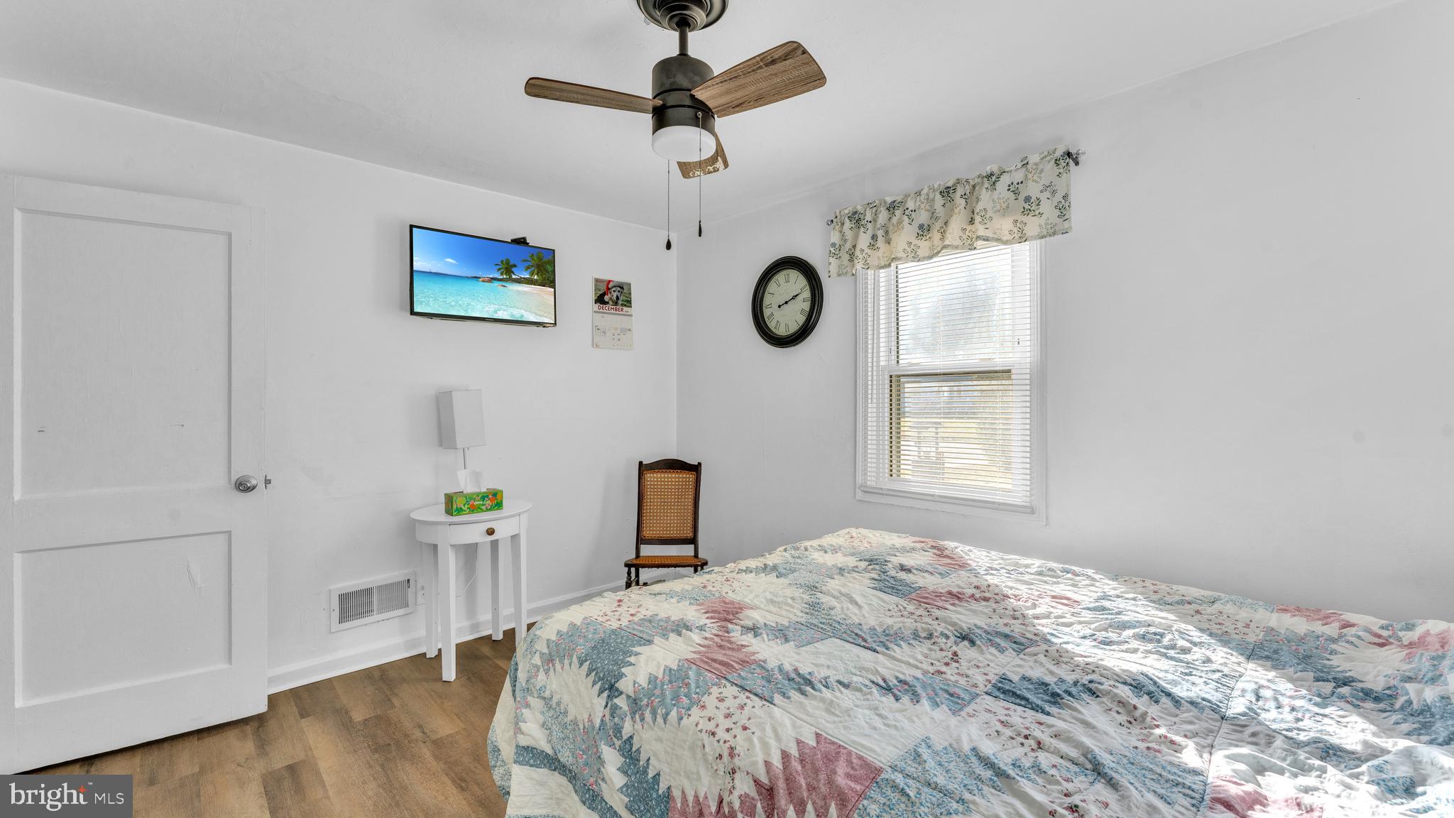 1065 Janes Road Dover, DE 19901 - Photo 12 of 23 a bedroom with a bed and a window