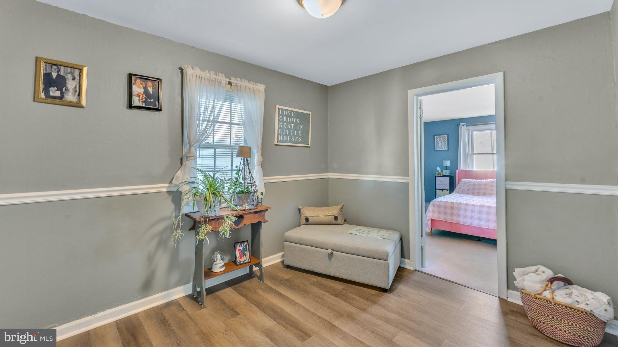 1065 Janes Road Dover, DE 19901 - Photo 14 of 23 a bedroom with furniture and a wooden floor