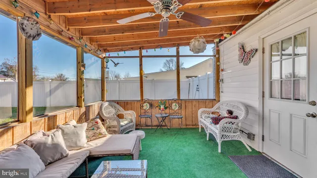 a backyard of a house with seating space