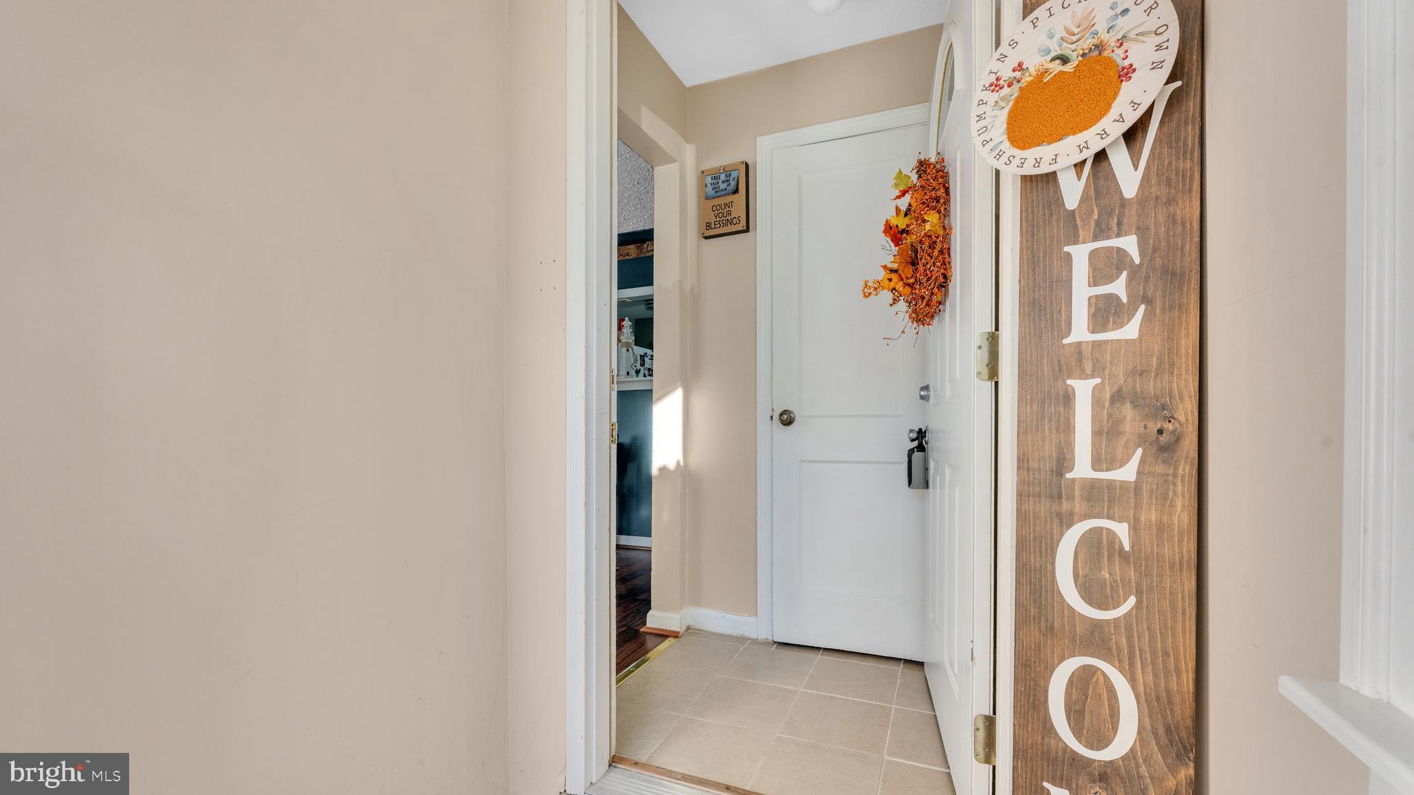 1065 Janes Road Dover, DE 19901 - Photo 4 of 23 a view of an entryway with wooden floor