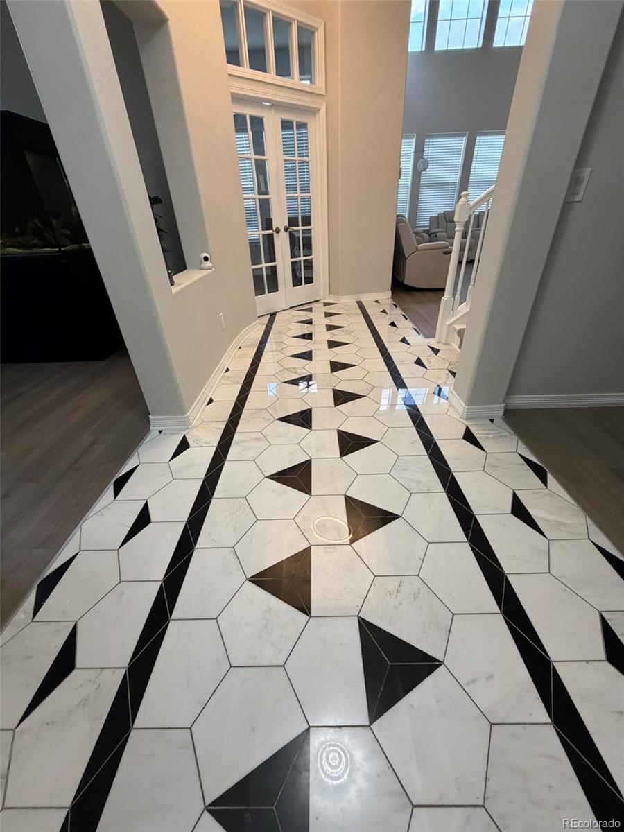 7242 South Rome Street Aurora, CO 80016 - Photo 22 of 33 a view of entryway