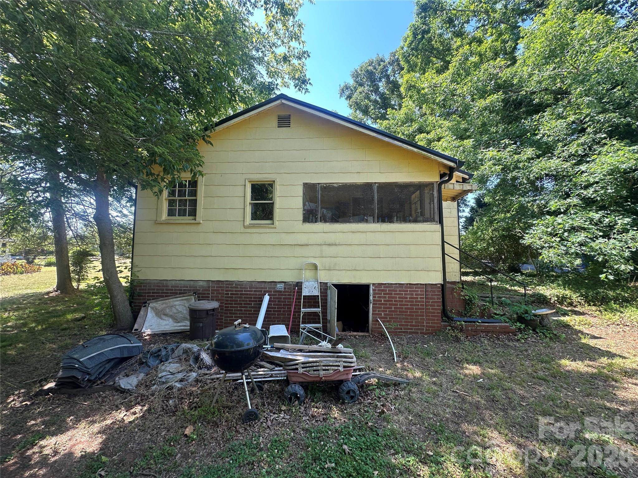 241 Wilson Road Rutherfordton, NC 28139 - Photo 13 of 14 a front view of a house with garden