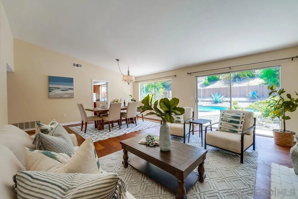7214 Durango Circle Carlsbad, CA 92011 - Photo 2 of 37 a living room with furniture and a large window