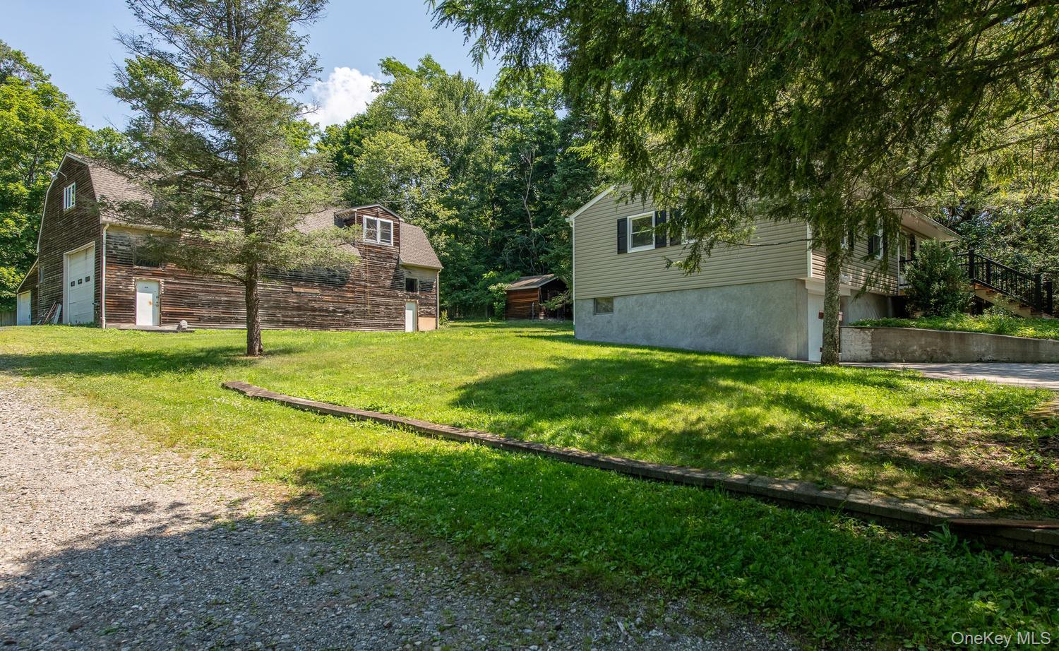 676-678 Oak Summit Road Millbrook, NY 12545 - Photo 3 of 38 Huge detached garage with lift