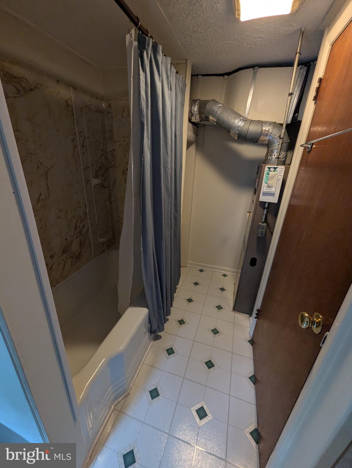 3729 Abingdon Beach Road Abingdon, MD 21009 - Photo 24 of 85 a bathroom with a shower and a sink