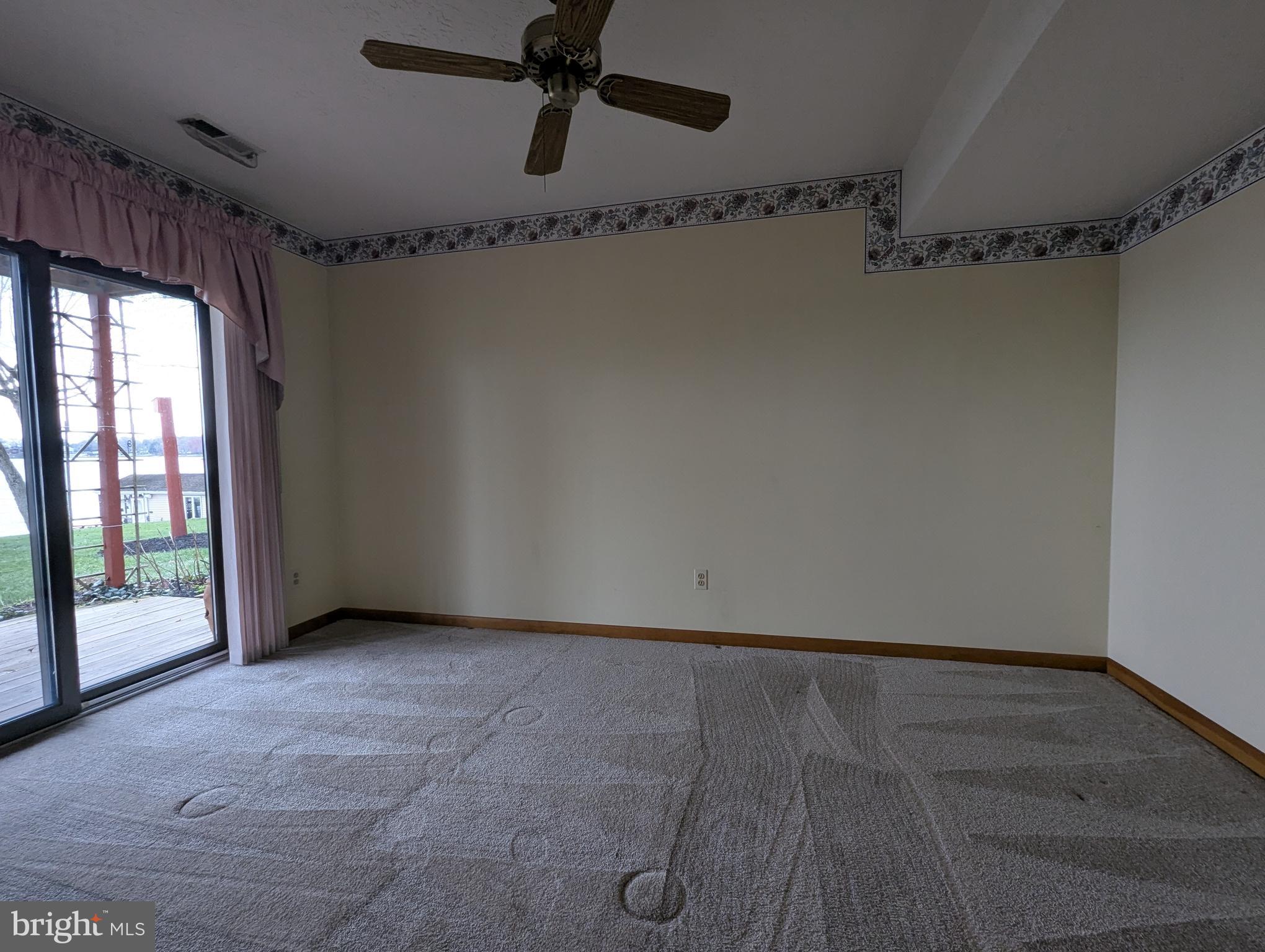 3729 Abingdon Beach Road Abingdon, MD 21009 - Photo 63 of 85 a view of an empty room with a window