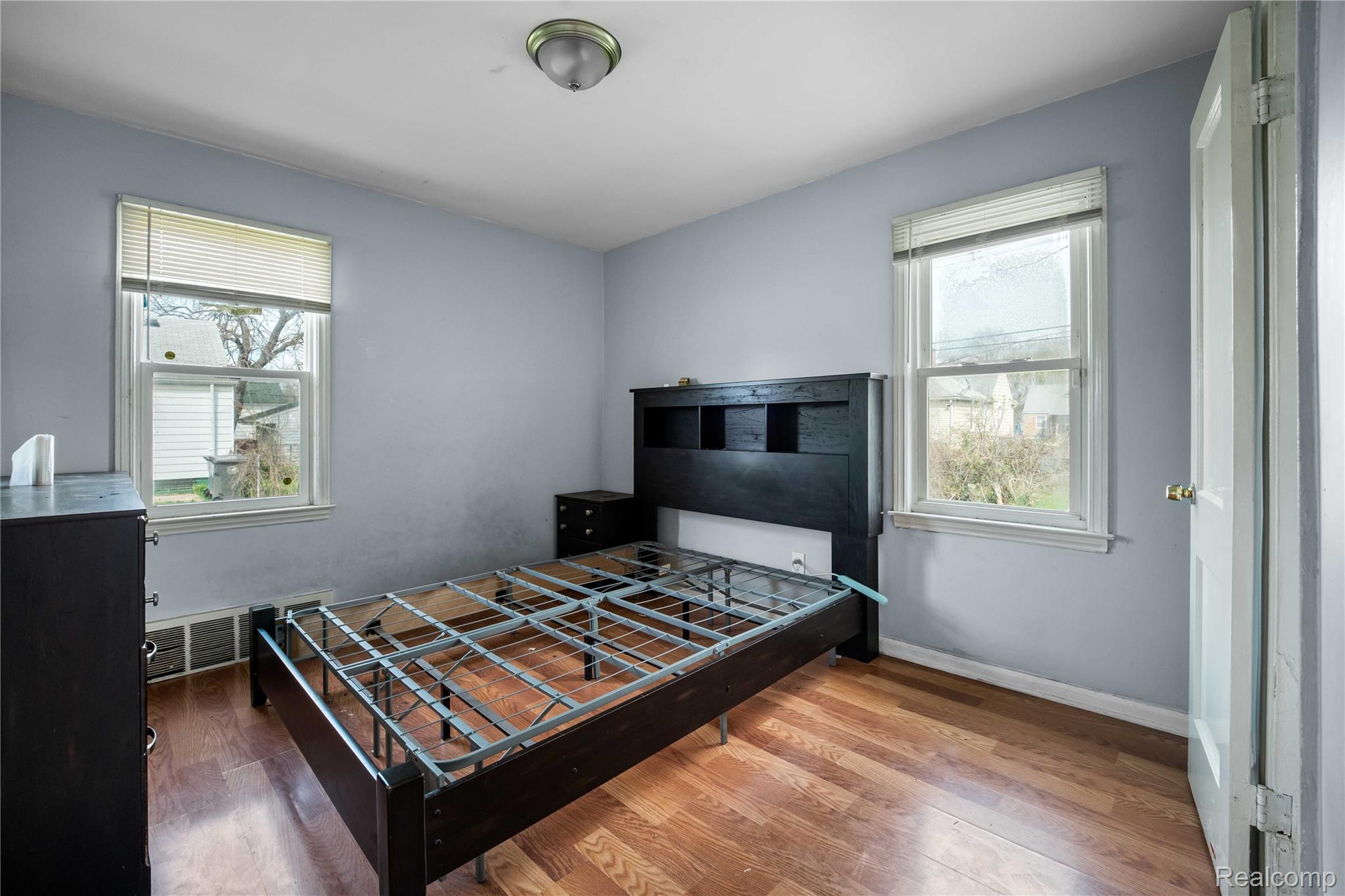 4049 Williams Street Inkster, MI 48141 - Photo 10 of 21 Bedroom featuring wood finished floors and baseboards