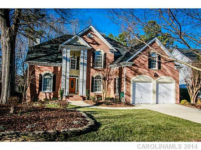 3413 Rhett Butler Place Charlotte, NC 28270 - Photo 1 of 15 a view of a house with large trees and plants